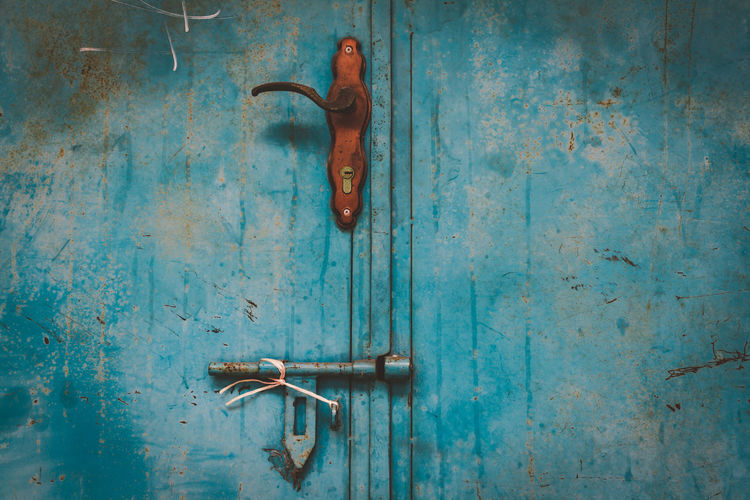 Full frame shot of rusty metallic door