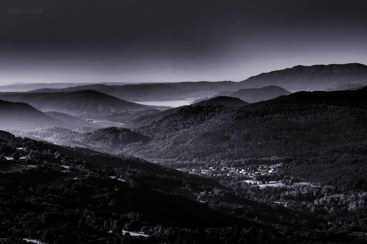 Scenic view of landscape against mountain range