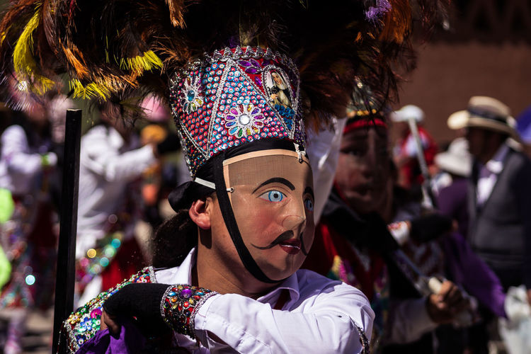 Close-up of man wearing mask and costume