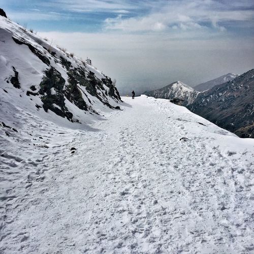 Scenic view of snow covered mountains
