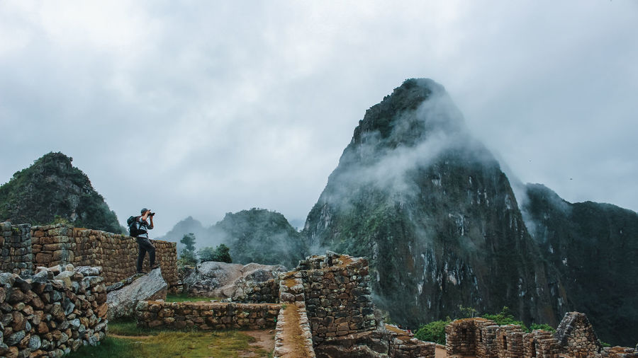 Tourist visiting machu picchu