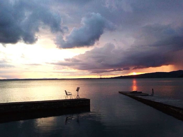 Scenic view of sea at sunset