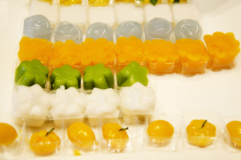 Close-up of multi colored candies in tray
