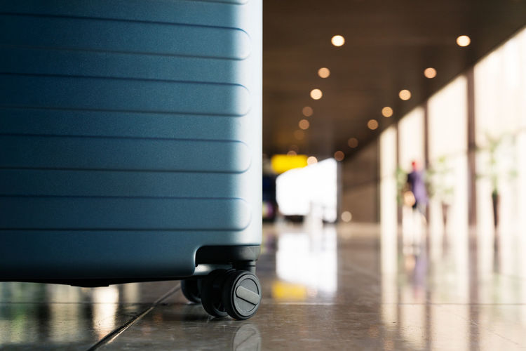 Suitcase in airport departure airport terminal waiting area, rea