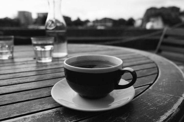 Close-up of coffee cup on table