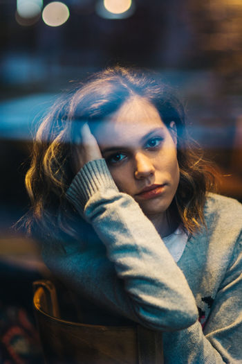 85 Looking At Camera Adult Beautiful Woman Beauty Casual Clothing Close-up Focus On Foreground Illuminated Indoors Indoors Looking Looking At Camera Night One Person One Young Woman Only People Portrait Real People Warm Clothing Window Young Adult Young Women