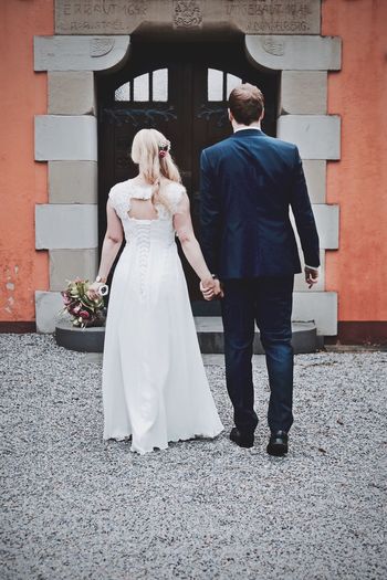 Rear view of newlyweds