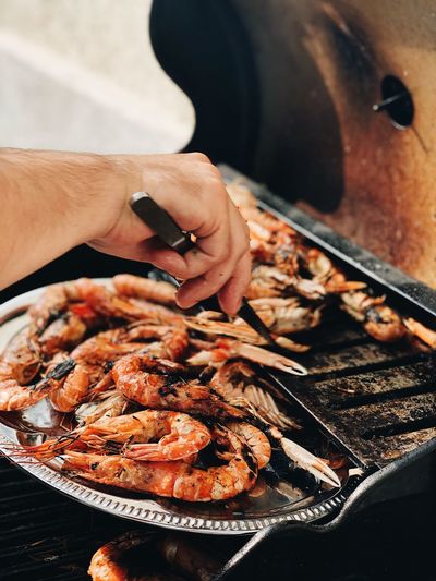 Midsection of woman preparing food