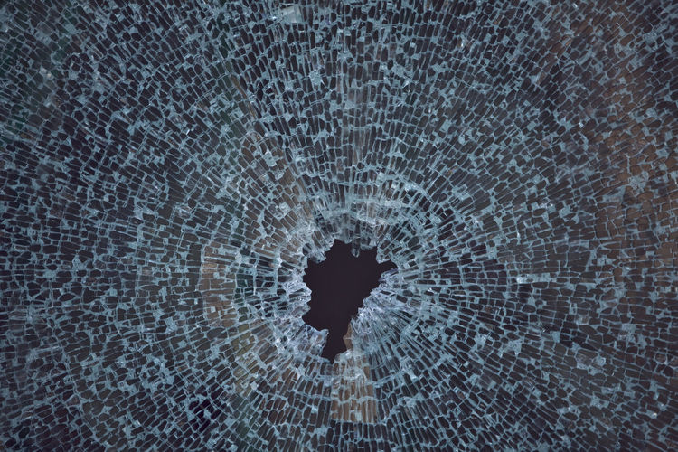 Close-up of broken glass pane
