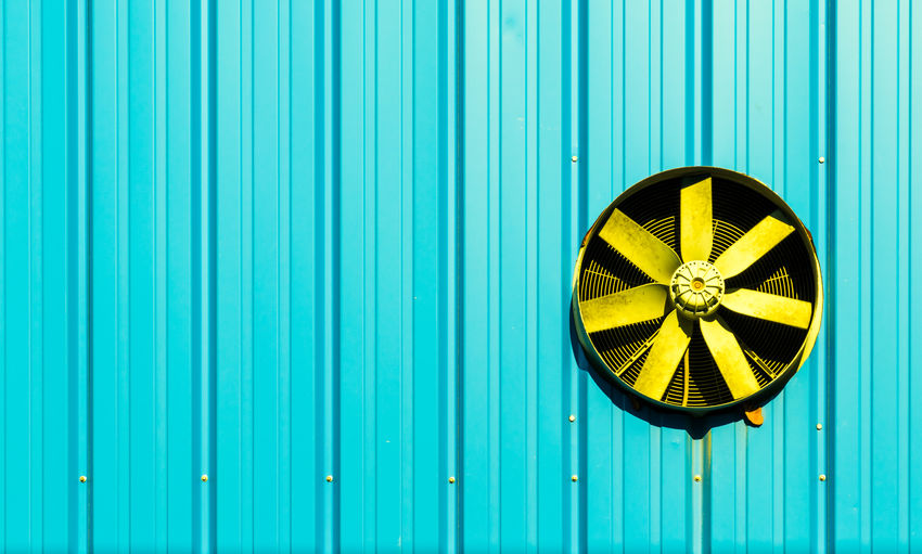 Close-up of exhaust fan on wall