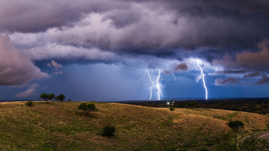 Lightning bolts strike from a strong thunderstorm near sonoita, arizona.