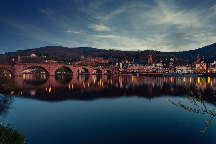Panoramic view of heidelberg's old town with the castle at dusk, germany.