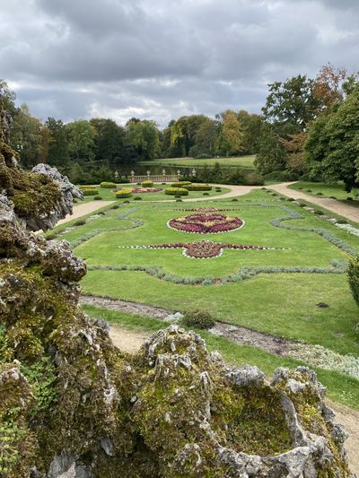 Scenic view of garden against sky