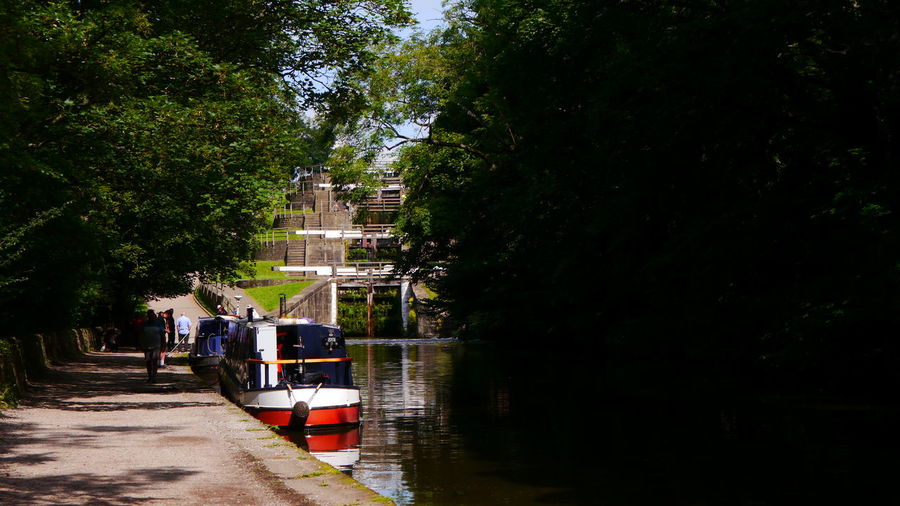A boat waiting to ascend bingley five rise locks, august 2021