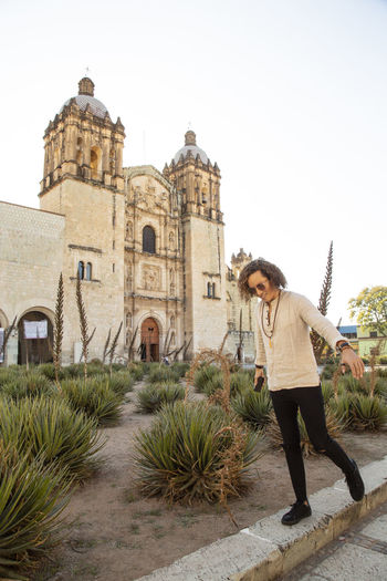 Mexican man chilling outside santo domingo church in oaxaca