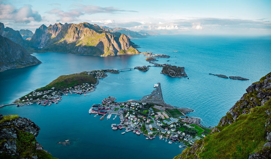 High angle view of sea and mountains against sky, lofoten, norway