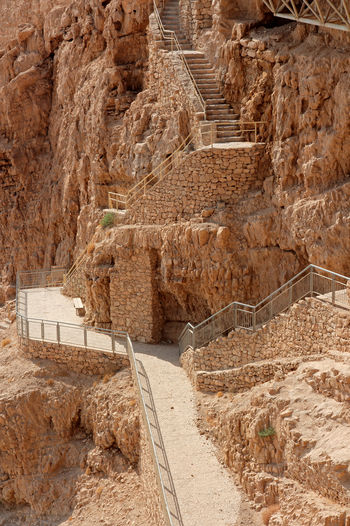 Walkway at the masada ruins - an ancient fortress on the eastern edge of the judean desert, israel