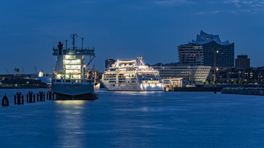 Illuminated cruise ships at port