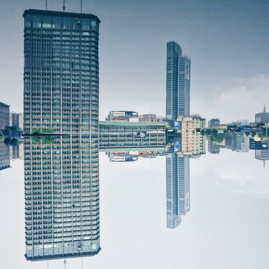 Low angle view of modern buildings against sky