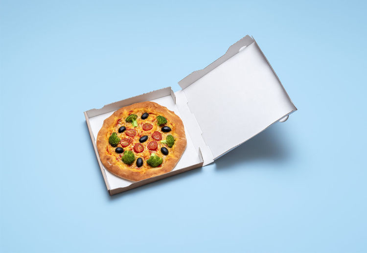 High angle view of food on table against blue background