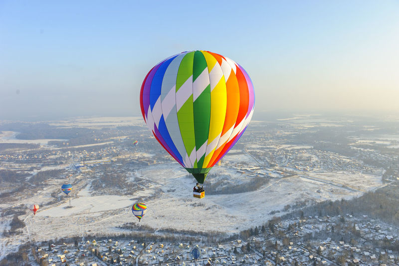 Hot air balloons flying in sky