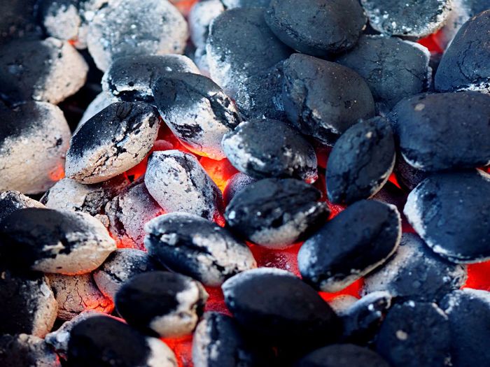 Full frame shot of coal in barbeque