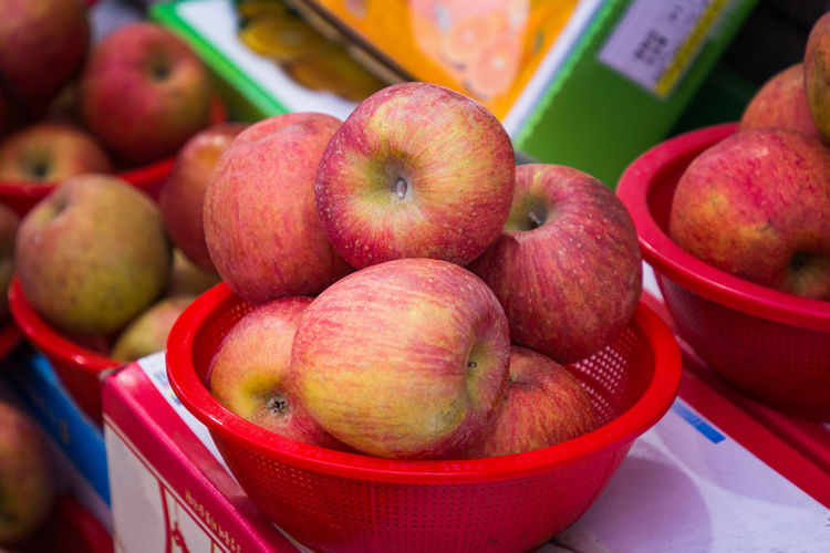 Close-up of apples for sale at market stall