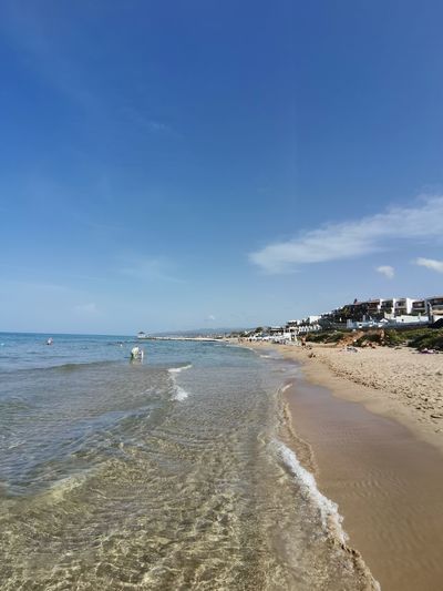 Scenic view of beach against sky