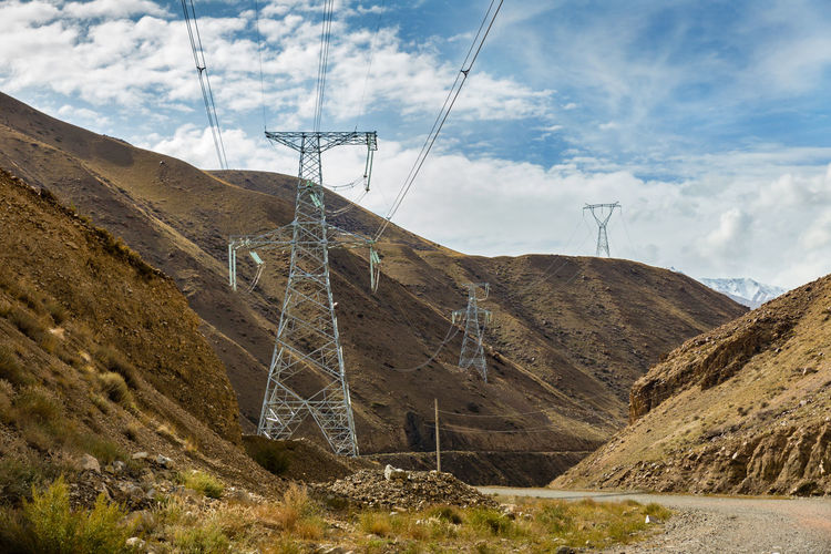 High voltage power transmission pylon in the mountains, kyrgyzstan