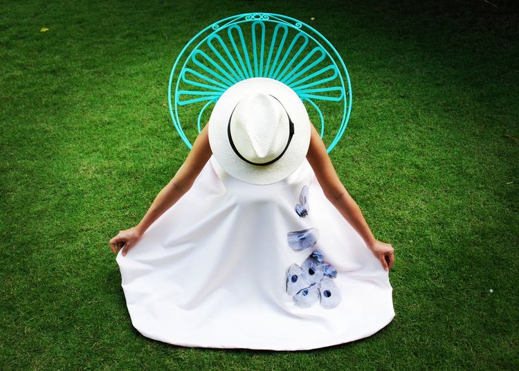 Rear view of man in grass
