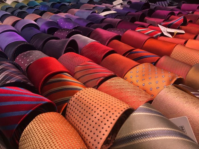 Close-up of ties in row