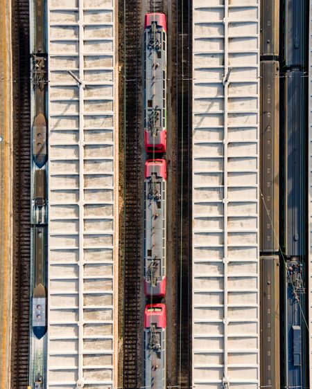 Aerial view of santa apolonia train station, view of the railways from top with building