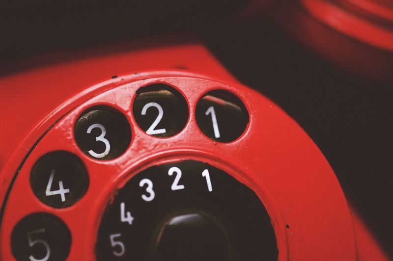 Lose-up of red rotary phone