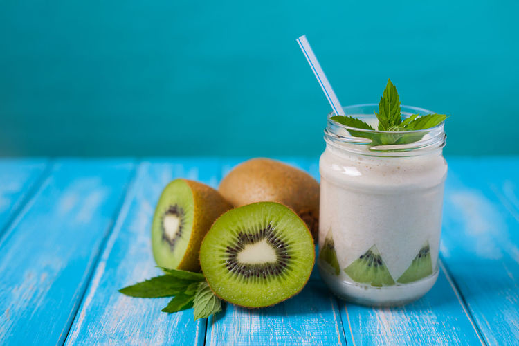 Close-up of drink with kiwis