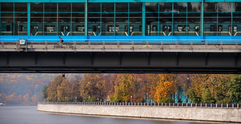 Railway bridge over river during autumn