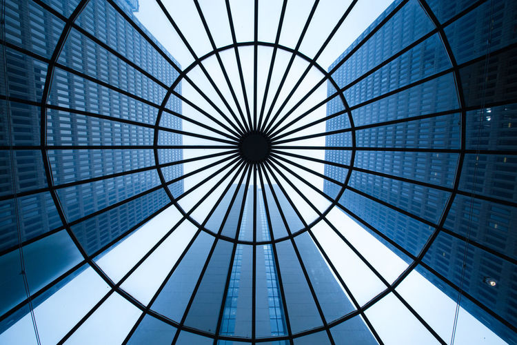 Directly below shot of buildings seen through skylight