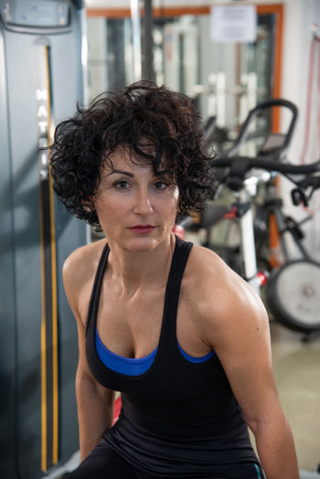 Portrait of mature woman in gym