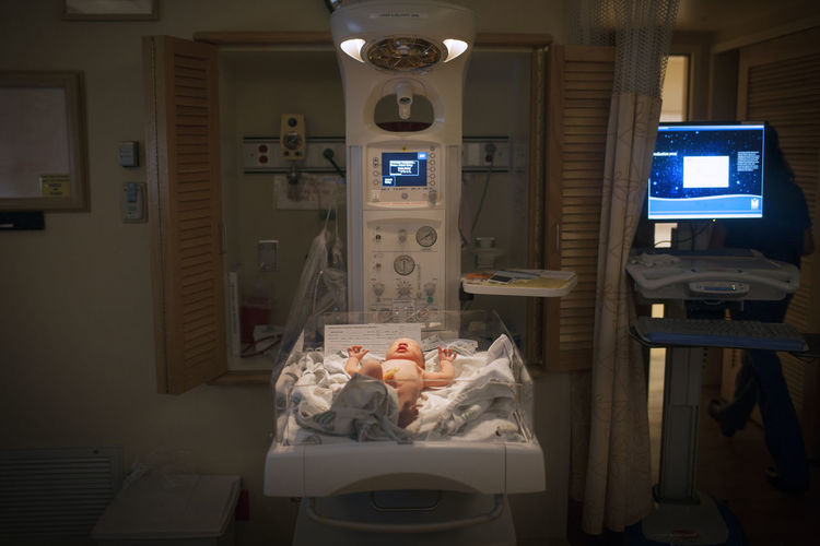 Baby lying in incubator