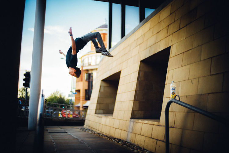 Man jumping in city