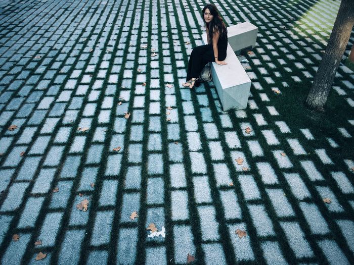 Woman sitting in park