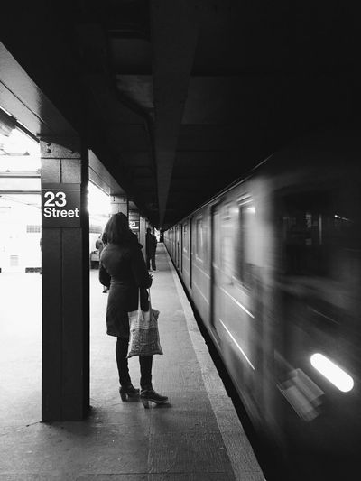 Blurred motion of woman in subway
