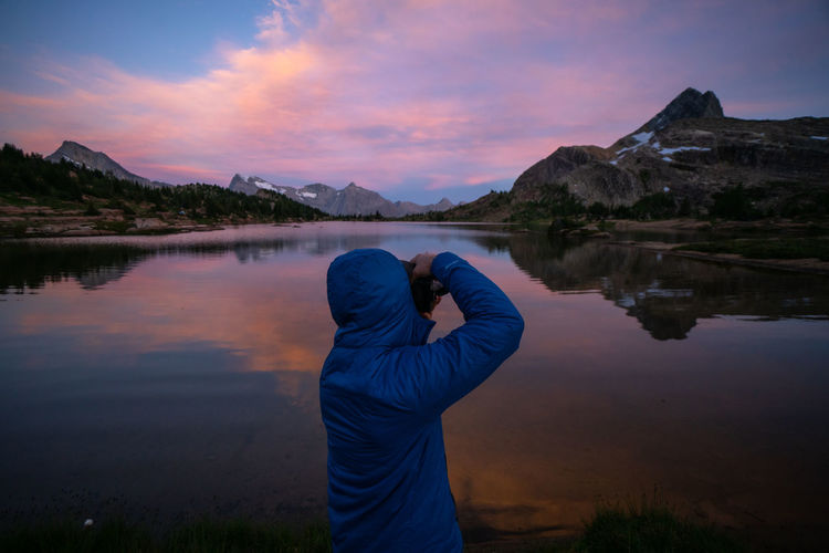 Photographer taking sunset photo at limestone lakes