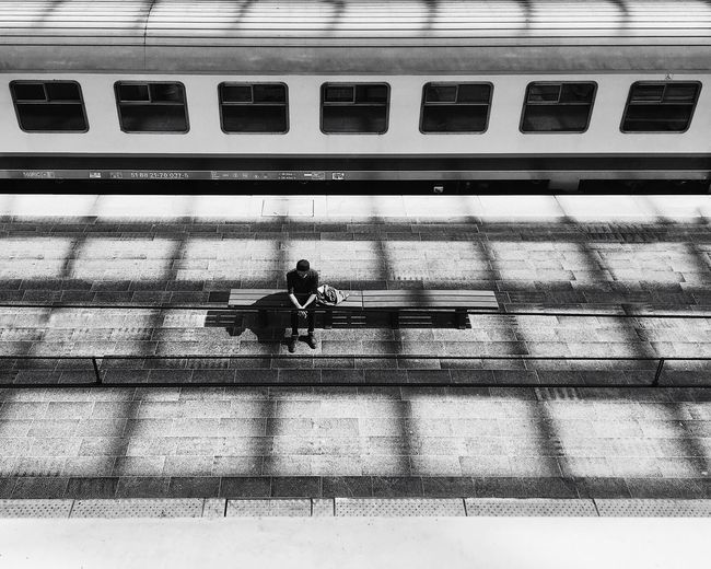 High angle view of man at railroad station