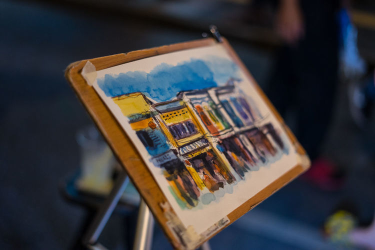 High angle view of painting on easel