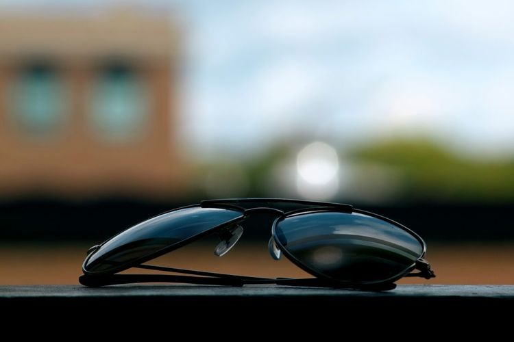 Sunglasses on windowsill