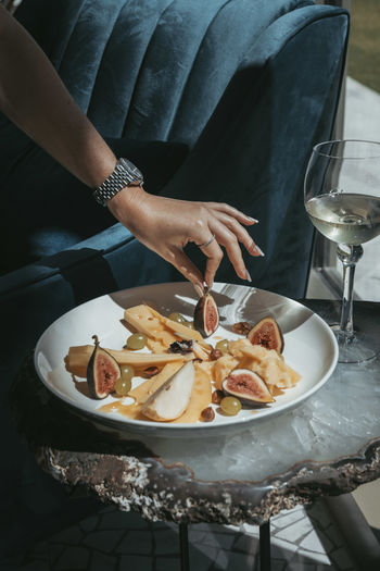 Midsection of woman preparing food