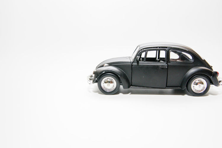 Toy car on white background