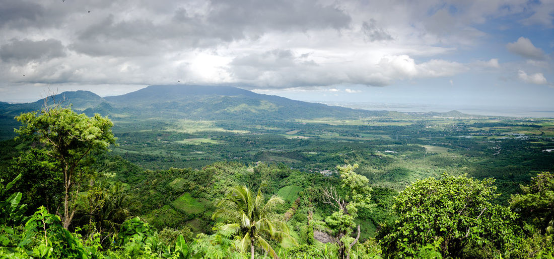 Panoramic view of mountains in calauan, laguna, philippines with the lake in the background.