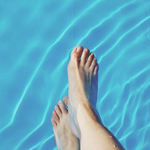 Low section of legs in water