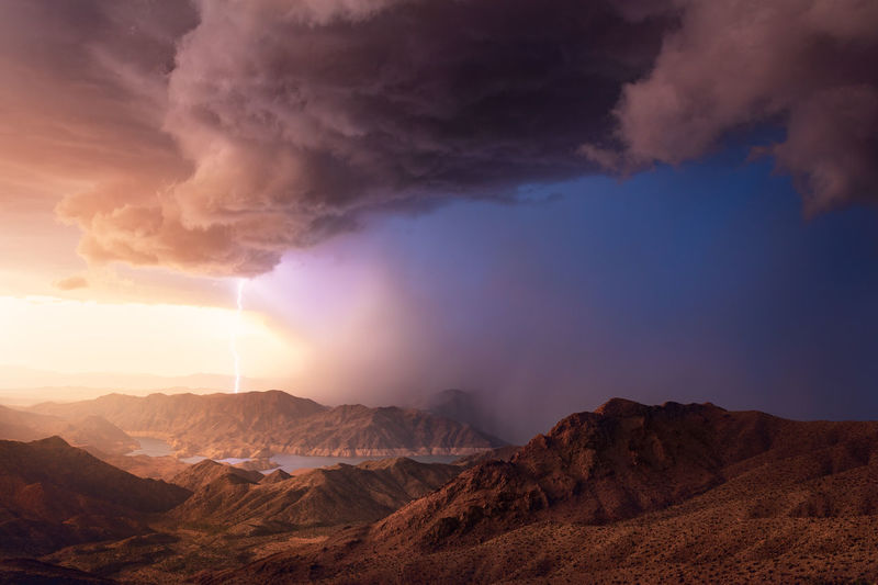 Scenic view of mountains against sky during sunset